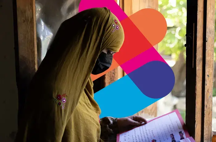 Women learn to read and write through a literacy initiative supported by UN Women, in Nuristan province, eastern Afghanistan. As part of the initiative, 130 Village Literacy Committees were also established, to help reach vulnerable women and girls in remote communities. Photo: UN Women/Sayed Habib Bidell