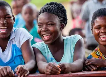 Members of the Mulanje Teen Club enjoy a debate around some of the challenges facing youth in Malawi. Photo: UNICEF/Karin Schermbrucker.